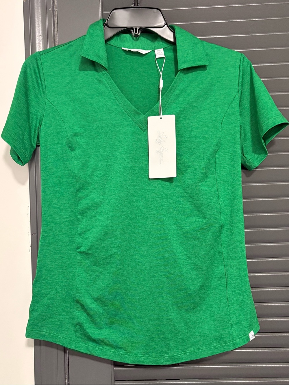 Lady Hagen Bright Green V-Neck Polo Tee with SPF